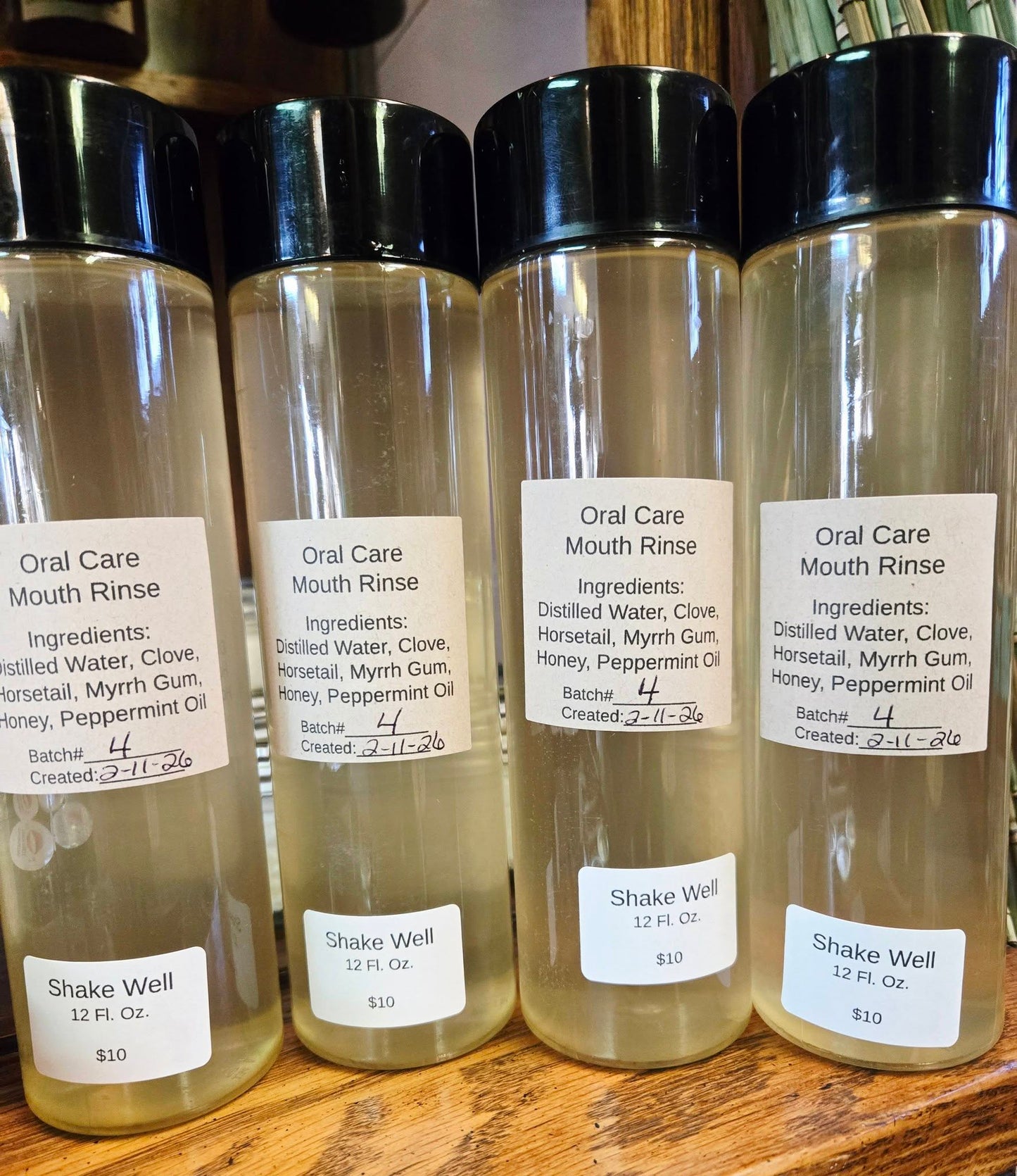Natural herbal mouth rinse made with clove, horsetail, and myrrh for gum and oral care support.