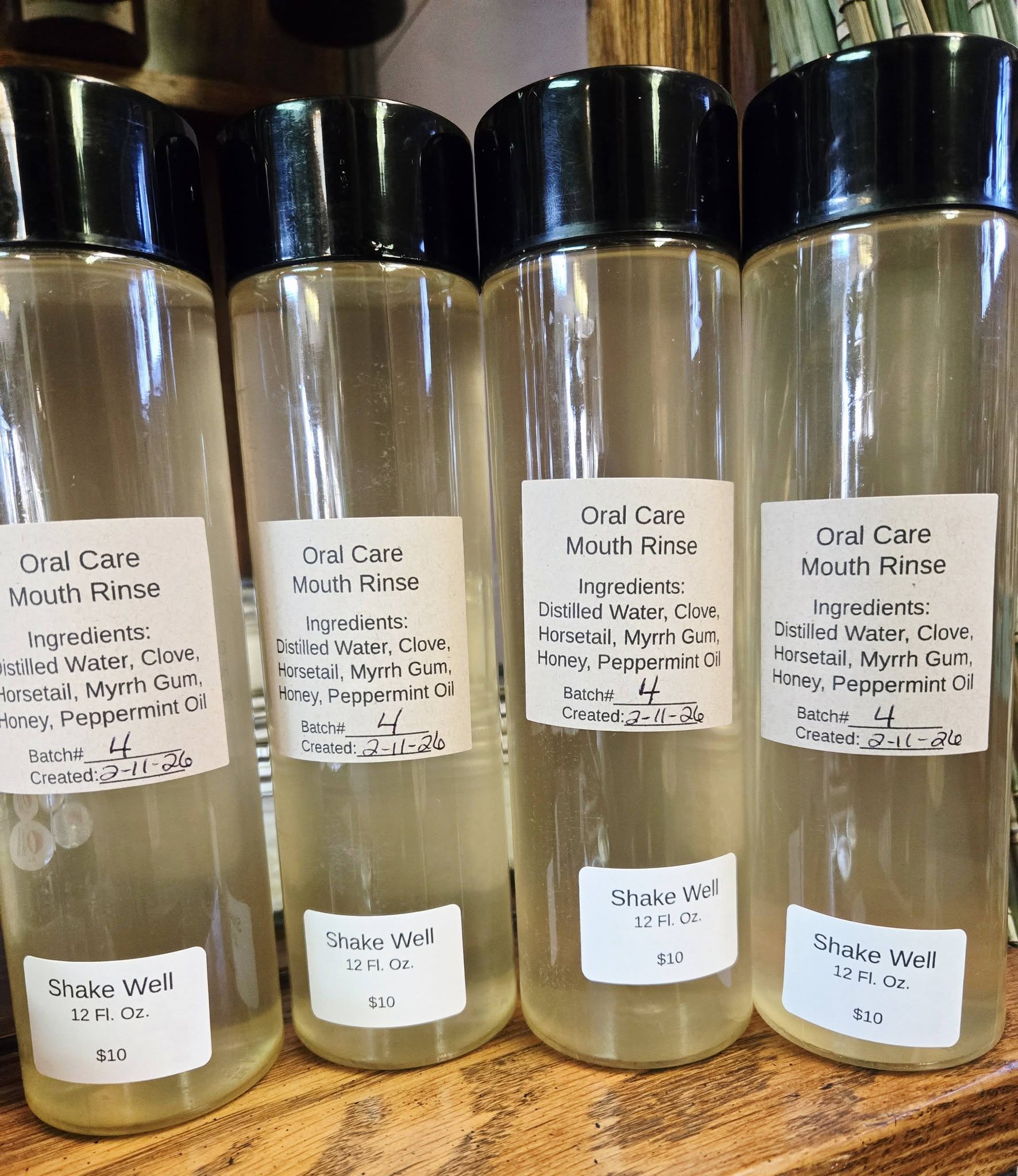 Natural herbal mouth rinse made with clove, horsetail, and myrrh for gum and oral care support.